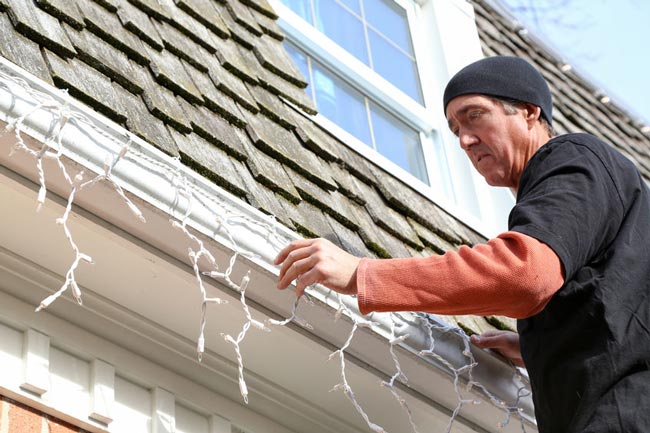 What Is the Safest Way to Remove Christmas Decorations from A Roof?