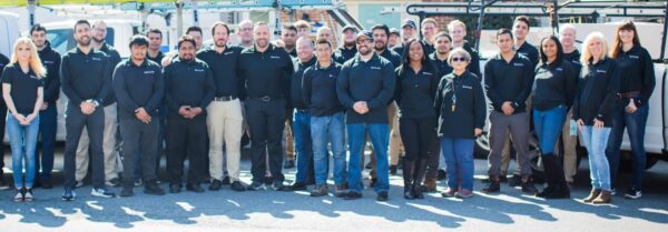 Company group photo of our team at American Custom Contractors.