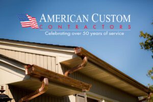 2 levels of copper gutters that flow into each other mounted on the roof line of a home