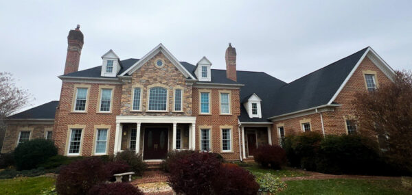 Brick home located in Cockeysville MD. Featuring a Timberline HDZ roof in charcoal.