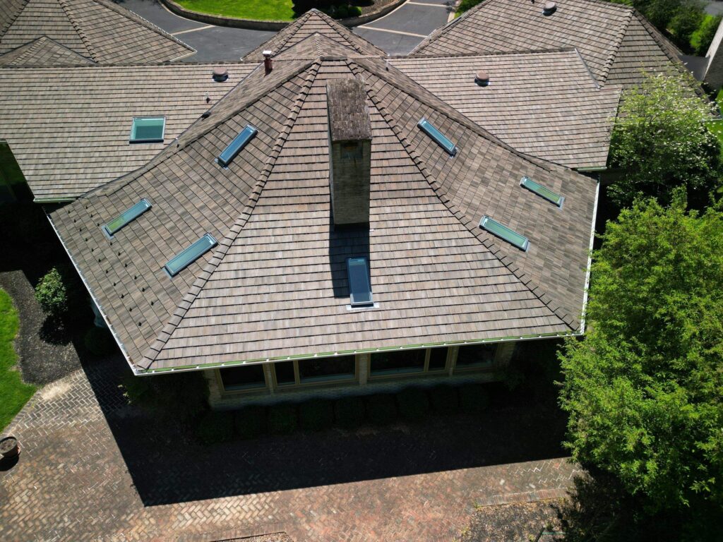 Skylight installation on a roof replacement. BRAVA roof system was installed using the financing a roof, siding, or windows project option through American Custom Contractors.