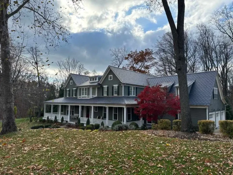 Potomac, MD home featuring James Hardie siding and EcoStar Synthetic slate roof tiles