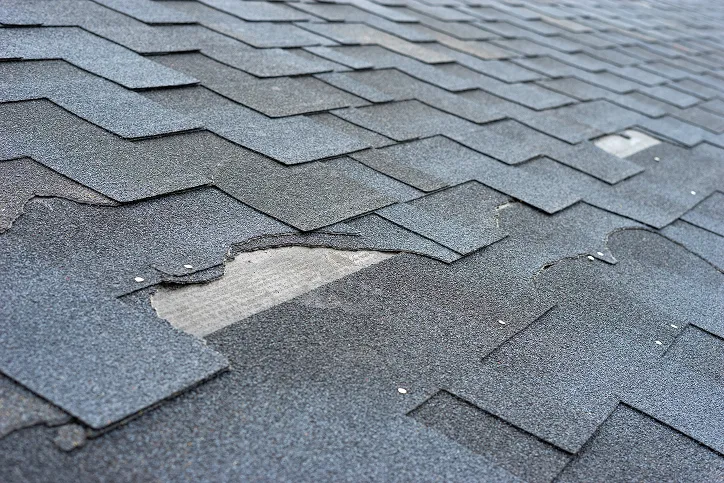 broken asphalt roof